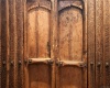 Hand carved doors leading to primary bedroom