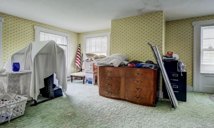 Another bedroom. Once again, large windows allow so much natural light.