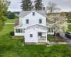 Convenient side entrance to large laundry/mud room.