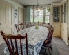 Light filled Country kitchen features built in china cabinets, and 2 pantries.  Note the original glass doorknobs and once again, beautiful property views.