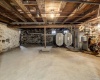 This basement is dry!!  two 300 gallon oil tanks, 5 zone heat. Bilco doors to backyard.