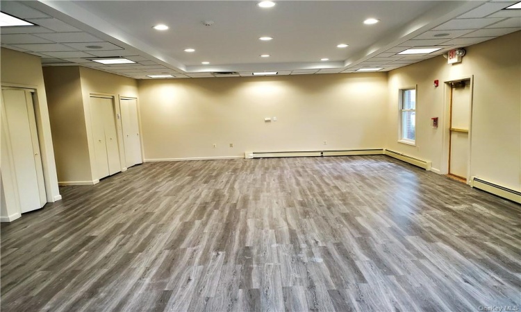 The wide open floor space is ready for your design.  Looking toward rear.