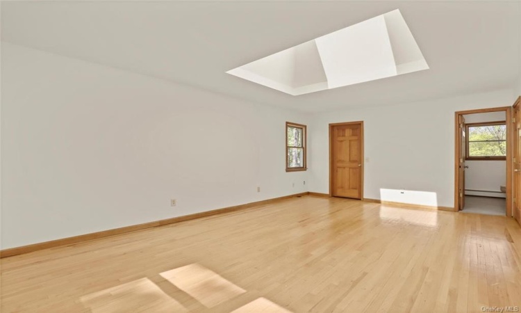 Spacious Primary Bedroom with an oversized walk in closet and Bathroom.