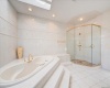 MBR Bath w 10 jet Jacuzzi & Steam Spt Shower