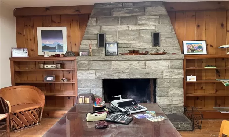 Extra large office space/flex space with a stone fireplace