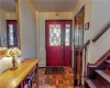 Main entrance with stairs to living/family room.