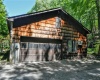 2 car garage offers high ceilings, workshop and attic storrage.