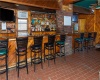 Seated at the bar, one has view of the river from the windows.