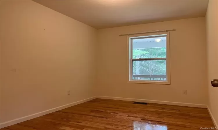 Bedroom featuring Hardwood flooring