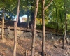 Stone Wall from street level looking West