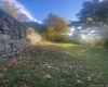 Looking south, Rear of property and west Stone Wall