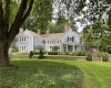 Gracious and Romantic circa 1929 Manor house in the heart of Bedford on 9 1/2 gloriously landscaped acres