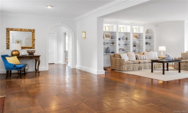 Spacious entry hall w/original inlaid mosaic oak flooring created  by  Italian artisans