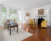 Second seating area in the  living room showcasing the hand carved marble fireplace