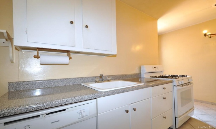 Eat-in Kitchen has plenty of cabinetry and counter space.