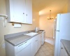 Eat-in Kitchen has plenty of cabinetry and counter space.