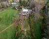 Vew of rear of house, carriage house and caretaker homes