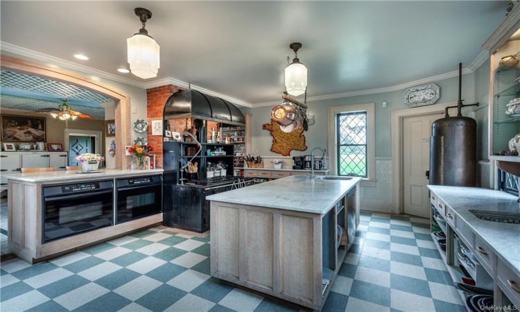 Main kitchen looking into breakfast room