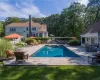 Stone Terracing framed by lawn privately set