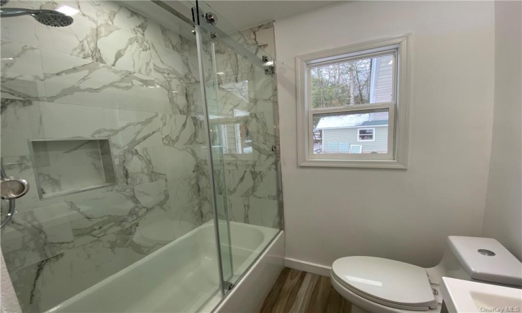 FULL BATH WITH CUSTOM MARBLE SHOWER/BATHTUB