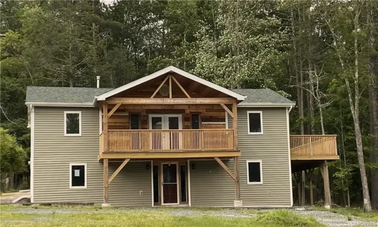 Rear view of house with a balcony