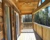 UPPER FRONT DECK WITH CUSTOM WOOD