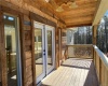 UPPER FRONT DECK WITH RUSTIC WOOD