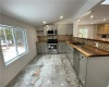 KITCHEN WITH CUSTOM MARBLE FLOORS