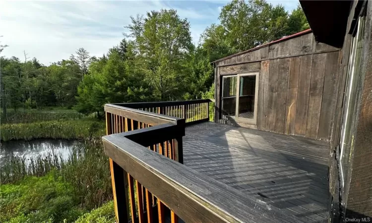 Wooden deck with a water view