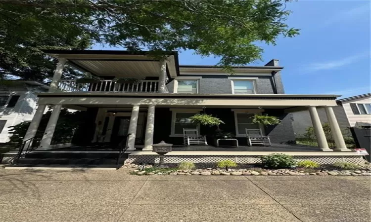 View of front of property featuring covered porch