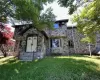 View of front of house with a front lawn