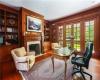 The first floor private office also looks over the property and has magnificent custom millwork.