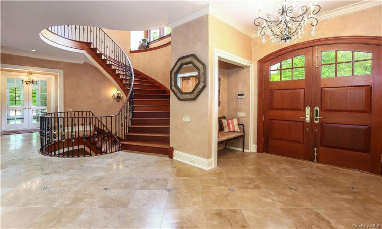 The most spectacular formal foyer greets you and your guests.