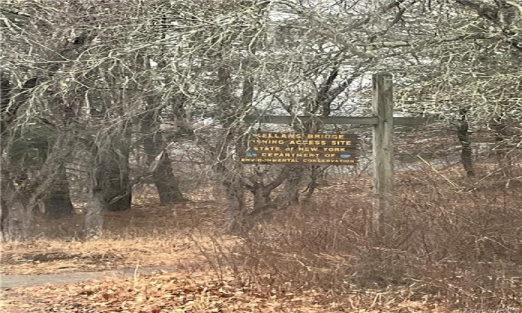 Adjacent lot across the street - fishing access.