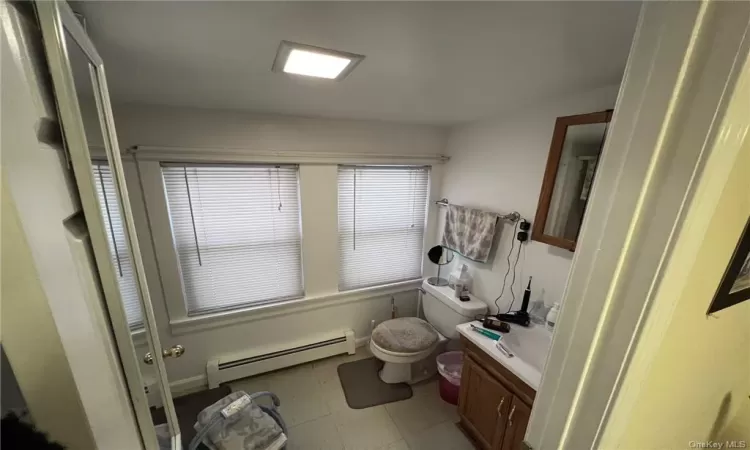 Apt. D bathroom.  Shower/tub combo.