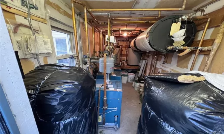 Utility Room.  4 hot water heaters, 4 boilers.  Tenants pay all utilities.