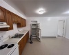 Apt A.  Updated. Electric oven/range and refrigerator.