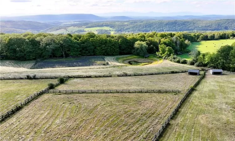 View of yard with a mountain view and a rural view