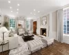 Gracious Living Room with Woodburning Fireplace and 9' Ceiling. Virtually Staged.