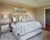 Primary bedroom with tray ceiling