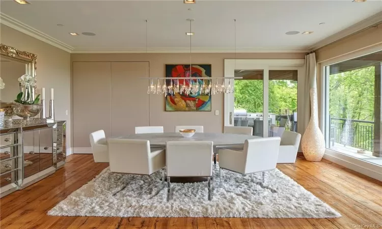 Dining room with doors to kitchen and access to garden