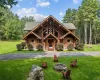 Cabin featuring a front yard