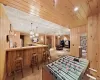 Game room featuring wood walls and light carpet