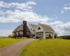 Craftsman-style house featuring a front yard