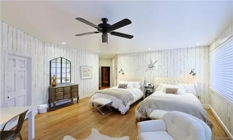 Bedroom featuring hardwood / wood-flooring and ceiling fan