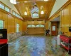 garage/flex space with beautiful stone floors