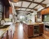 Oversized Kitchen with high ceilings and stunning views looking over the pool