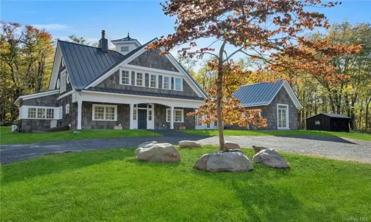 View of front facade with a front lawn