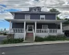 View of front of home featuring covered porch