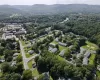 Drone / aerial view featuring a mountain view